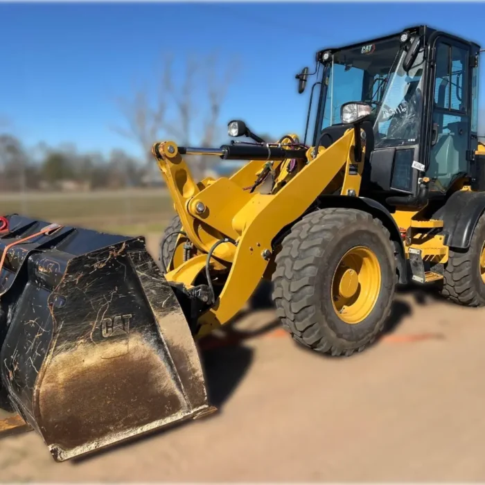 2022 Caterpillar 908M compact wheel loader with high-torque Cat C3.3B engine, articulated steering, and multi-function joystick for precision material handling and construction.